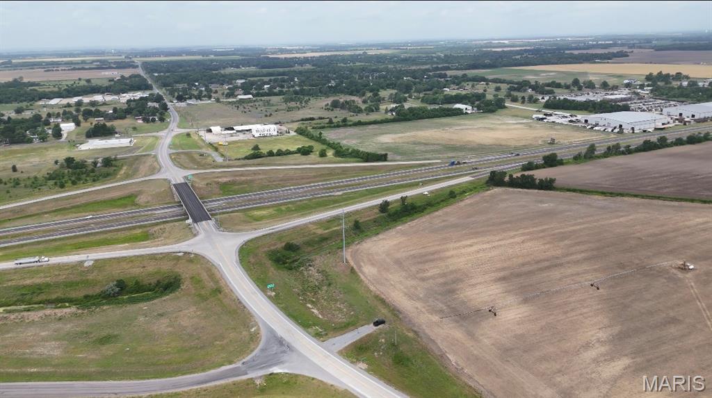 Strategically positioned just off Exit 69 on Interstate 55 North, this prime, high-traffic vacant ground spans over 22 acres and offers exceptional visibility, constant drive-by exposure, and effortless ingress/egress. Surrounded by established retailers and a strong daytime population, it’s ideal for retail, restaurant/QSR, service, medical, or professional uses.