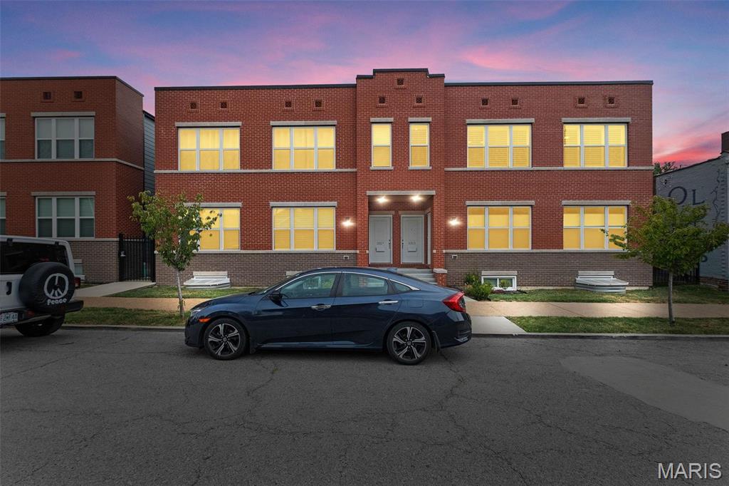 NO TAXES FOR 5.5 YRS. NEWER CONDO HAS BEAUTIFUL UPGRADES, 2 CAR PRIVATE GARGE ACCESSIBLE THROUGH PRIVATE & FENCED BACK YARD WITH huge MAINTENANCE FREE DECK. Upper level end unit has great view of the City. Each Building has 4 units. This unit has these perks upgrades:  Private main floor laundry, Granite countertop in Kichen and both full bathrooms, Luxury Vinyl Tile plank floors throughout, Subway tile backsplash, Farmhouse Karran sink, Black Delta plumbing fixtures, pendant lights. Huge Family Rm is completely open to Dining Rm which is open to Kitchen with Center Island that walks out to covered deck with private stairs to yard to 2 car garage with garage door opener. PRIVATE BASEMENT WITH TONS OF STORAGE. Located in the awesome Gate District in Lafayette Park area. Also added were custom plantation shutters for all windows and more. Come take a look at this stunner. This is a 2nd Level unit.