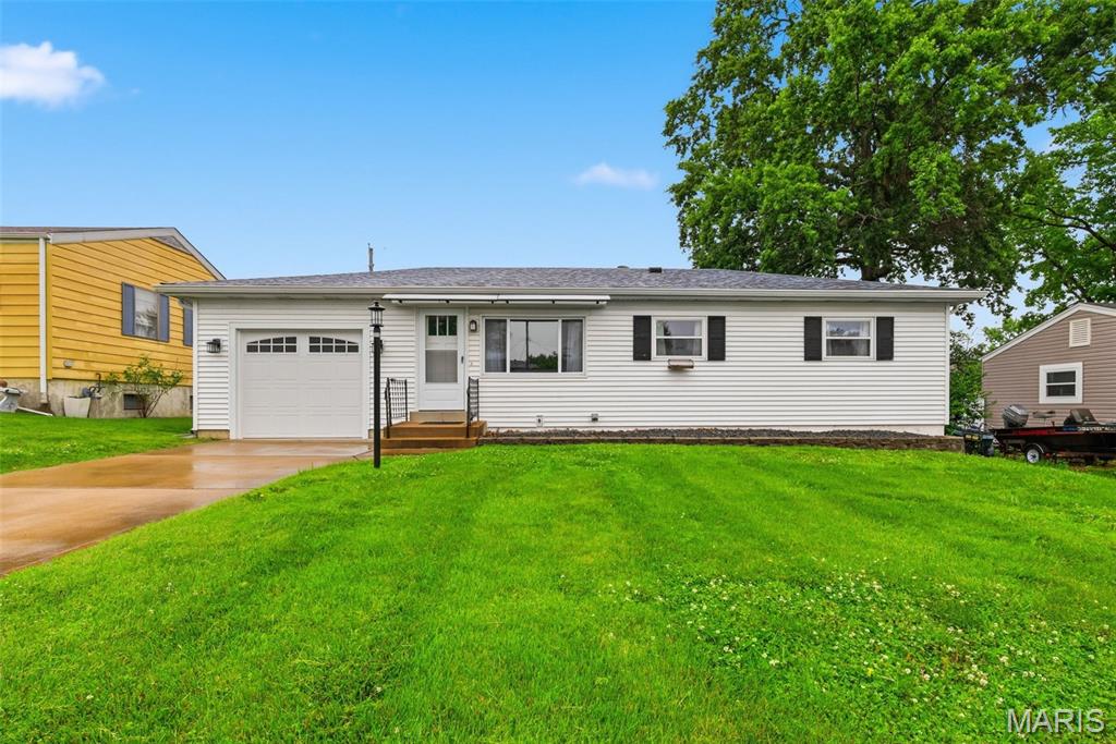 Move right into this beautifully updated 3-bedroom, 1-bath home that offers modern finishes, thoughtful improvements, and plenty of storage. Since 2019, the home has undergone extensive updates including refinished hardwood floors, new baseboards, 2-panel doors, light fixtures, and ceiling fans throughout.

The renovated kitchen features 42-inch shaker cabinets, solid surface quartz countertops, a ceramic tile backsplash, and stainless steel appliances, creating a stylish and functional space for everyday living. The updated bathroom includes a new vanity, fixtures, tub, and tile surround.

Additional improvements include a newer driveway, updated HVAC and water heater, and a clean, spacious lower level offering endless possibilities for storage, hobbies, or future finishing. Outside, you'll find a newer storage shed complete with built-in shelving and electricity, along with a detached 1-car garage built in 2023. Other recent updates include a new roof in 2020, upgraded awnings in 2023, and new front and rear entry doors with storm doors installed in 2026.

With quality updates already completed and pride of ownership throughout, this home is ready for its next owner to enjoy.