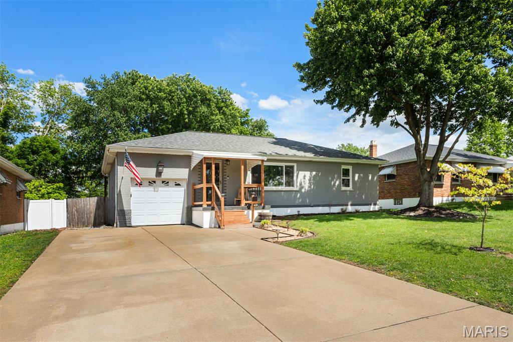 Curb appeal shines with a newly built covered front porch welcoming you home. Step inside this beautifully updated ranch featuring an attached garage and a bright, open layout. Gleaming hardwood floors flow throughout the main level, which includes a comfortable living room, dining area, and an updated kitchen.  The highlight of the home is the spacious vaulted family room, surrounded by windows that fill the space with natural light, plus a cozy corner electric fireplace—perfect for relaxing or entertaining.   Two generously sized bedrooms are located on the main floor and share an updated full bathroom. The finished lower level offers even more living space, including a rec room, a versatile office or sleeping area, and a second updated bath.   Out back, enjoy a private, fully fenced yard complete with a play area and a storage shed—ideal for outdoor living and extra storage. Roof 6 Yr, HVAC 1 year Refinished Floors, interior paint, baths updated   Seller provides a clear St Louis unincorporated County Inspection.  No Escalation clause or dot loop  Contracts due Sunday night 5/17 8PM  see agent remarks