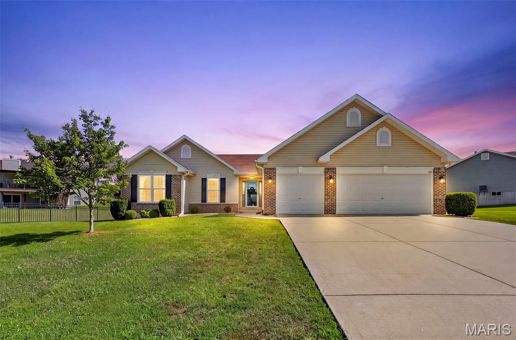 Welcome home to this meticulously maintained 3-bedroom, 2-bath ranch in the highly sought-after Riverdale Subdivision! From the moment you arrive, you'll appreciate the exceptional curb appeal, highlighted by the freshly painted black front door and shutters. Inside, the open floor plan features 9-foot ceilings, beautiful new flooring, fresh neutral paint, and abundant natural light throughout.
The kitchen is the heart of the home, offering a center island with breakfast bar, tile backsplash, soft-close cabinetry, and a spacious walk-in pantry. The adjoining breakfast room overlooks the backyard and opens to a concrete patio, creating the perfect setting for everyday living and outdoor entertaining.
The private primary suite features a large vanity, walk-in shower, and oversized walk-in closet. Two additional bedrooms are generously sized with ample closet space. A large hall closet, coat closet, and convenient main-floor laundry/mudroom provide exceptional storage and everyday functionality.
The unfinished lower level includes a bathroom rough-in and provides endless opportunities to create additional living space, a recreation room, home office, or gym while still offering plenty of storage.
Located in the desirable Fort Zumwalt School District, Riverdale offers outstanding neighborhood amenities including stocked fishing ponds, playgrounds, a pavilion, and common ground.
This move-in-ready home offers exceptional curb appeal, modern finishes, a functional layout, and room to grow—all in a sought-after neighborhood. Schedule your private showing today!