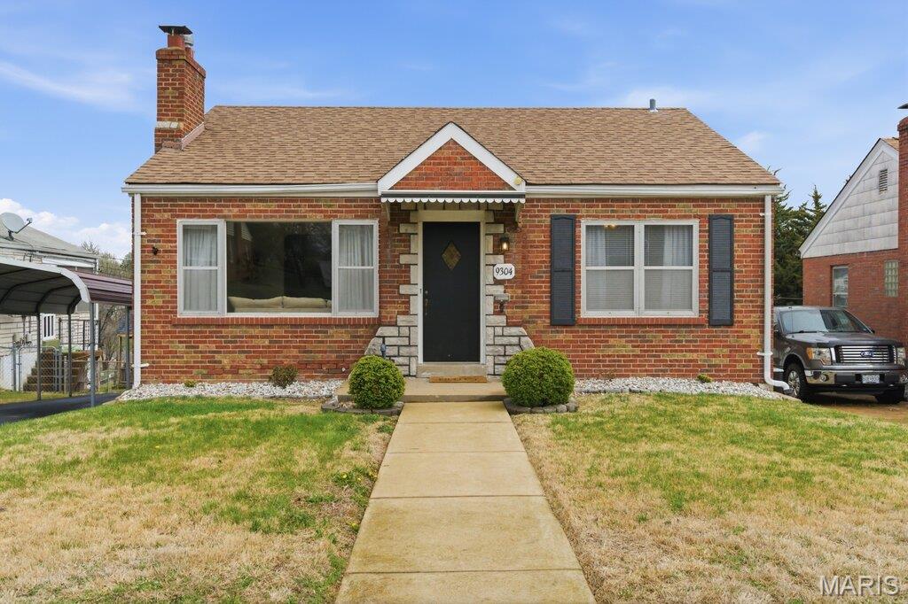 Welcome home to this charming ranch-style brick bungalow located in the highly sought-after Flora Gardens community! Featuring 2 bedrooms, 1 bathroom, and a 1-car garage, this move-in ready home perfectly blends original character with modern updates. Step inside to discover a warm and inviting interior, highlighted by a cozy wood-burning fireplace, built-in bookshelves, glass block windows, and fresh paint throughout. The beautifully renovated kitchen (2024) boasts new cabinetry, butcher block countertops, classic subway tile backsplash, and sleek stainless-steel appliances, perfect for everyday living and entertaining. Enjoy newer luxury vinyl flooring (2023) throughout the kitchen, family room, and bathroom, along with updated light fixtures that add a modern touch. The lower level provides ample storage space and features a generously sized finished room, ideal for a home office, gaming room, or personal gym. Outside, you’ll find a spacious, level lot with partial fencing, along with both a detached garage and carport for added parking spaces. Located just minutes from Grant’s Trail and the 9 Mile Garden, this home offers easy access to shopping, dining, and major highways, making it a perfect blend of comfort and convenience.