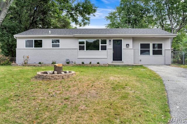 Welcome to 855 Northmoor Dr in Florissant a beautifully remodeled 3-bedroom, 1-bath home offering 1,184 square feet of thoughtfully updated living space, plus a converted garage providing additional flexible living area. From the moment you walk in, it’s clear this home has been renovated with attention to both style and the major systems behind the walls.The kitchen has been completely refreshed with new cabinetry, modern hardware, quartz countertops, a stylish backsplash, and updated finishes. The bathroom features a new tub and tile surround, upgraded vanity, tile flooring, and new faucets. Throughout the home, you’ll find new vinyl flooring, fresh interior and exterior paint, new doors and hardware, tall base trim, updated light fixtures, ceiling fans, and new can lighting.

The improvements go well beyond the cosmetics. The home features a new permitted architectural roof with a complete tear-off and plywood inspection, all-new PVC plumbing lines throughout the home and basement to the exterior connections, and several new copper water lines. New electrical wiring was pulled through the walls to provide updated 3-prong outlets, along with new can lighting, electric smoke detectors, and fixtures throughout. The electrical work was permitted.

Downstairs, a new drain tile and sump pump system has been installed with a transferable warranty. The basement concrete floors were opened to allow for new PVC plumbing installation which is a major improvement representing approximately $10,000 of work. The home also features a new water heater and furnace 2026, with permitted installations, along with many new vinyl windows.

Outside, enjoy a beautiful backyard and a completely refreshed landscape. Trees along the fence were removed in accordance with Florissant requirements, and the yard has been professionally cleaned up and landscaped to create an inviting outdoor space.

This is much more than a cosmetic remodel it’s a home where the major systems, finishes, and exterior have all received significant attention. All for under $190,000 is an incredible opporunity for your new home.