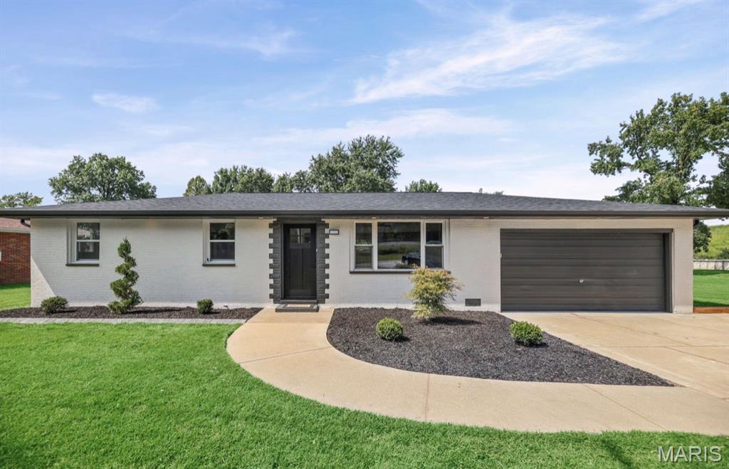 COMPLETELY RENOVATED RANCH! 
This stunning home has been transformed inside and out and is truly move-in ready! Step inside to a bright, open-concept layout featuring beautiful luxury vinyl plank flooring and a gorgeous electric modern designed fireplace that creates a warm and inviting focal point. The spacious kitchen features 42” upper cabinetry, soft-close cabinets and drawers, quartz countertops, center island, and all-new stainless steel appliances. The primary suite offers a private full bath, while two additional bedrooms provide comfortable living space.

The updates go far beyond the cosmetics, NEW roof, NEW HVAC, NEW plumbing, NEW electric meter service, NEW Hot Water Tank, approximately 90% rewired electrical, NEW siding on shed, NEW landscaping, and more! Outside, enjoy the oversized fenced-in yard, French drain, and convenient storage shed. If you’re looking for a beautifully renovated ranch with an incredible amount of NEW, this one is a must-see!