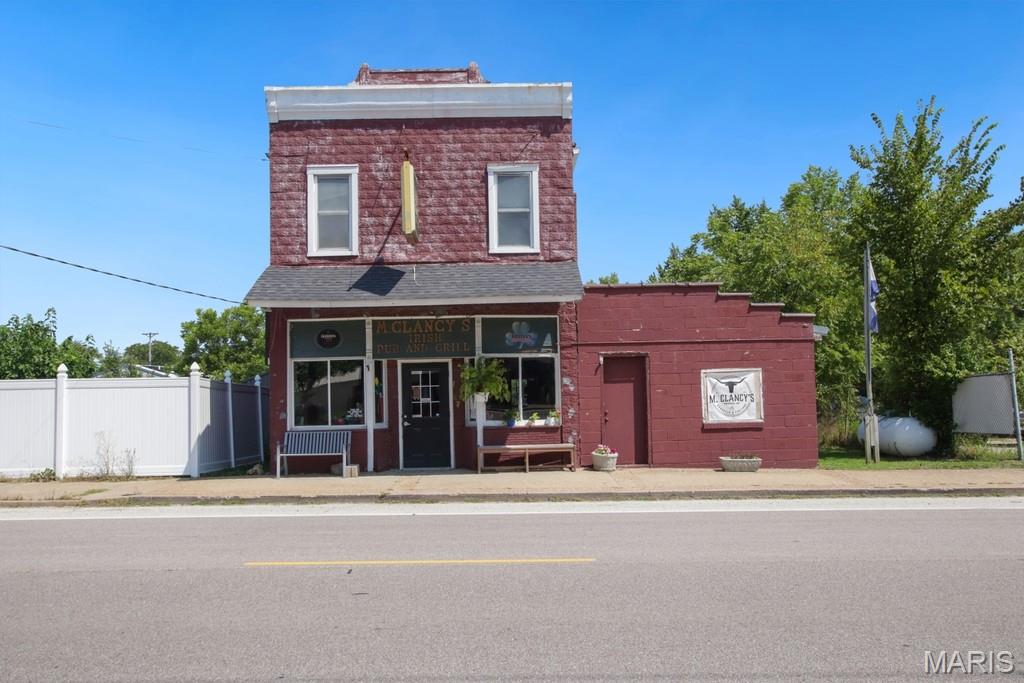 An Exceptional Business Opportunity! Own both the building and the established business of M. Clancy’s BBQ & Pub Fare, a beloved Rosebud landmark that has proudly served the community for many years. This rare turnkey offering includes the restaurant, furnishings, equipment, recipes, BBQ shed, and the goodwill of a well established local favorite. Ideally located in the heart of Rosebud, this property is positioned for exciting future growth with the Rock Island Trail set to run directly behind the building, bringing increased tourism, cyclists, and visitors to the area. The building also features an upper level space with the potential for residential living, short term rental, or additional rental income, providing even more investment possibilities. Surrounded by local attractions including a coffee shop, antique stores, boutiques, and specialty shops, this location flourishes during popular community events such as Rosebud Treasure Day, the Wine Walk, Christmas in Rosebud, and the town’s renowned Fourth of July celebration. Just minutes away, the Rosebud Resort & RV Park welcomes guests year round, while the historic town of Hermann, Missouri's Wine Country, is only a 25 minute drive away, attracting thousands of visitors annually. Whether you’re looking to continue the success of a well established restaurant, invest in a thriving tourism market, or become part of a close knit community rich in history and tradition, this one of a kind property offers exceptional potential. Don’t miss this opportunity to own a cherished piece of Rosebud’s past while investing in its exciting future.