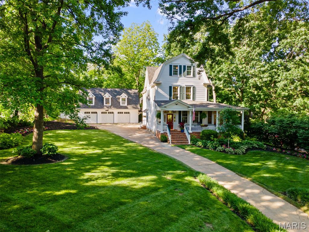 U/C 6-16-25 (21 DAYS CDOM, then Pending 7-16) Welcome to a Breathtaking Historical set gracefully back on a stunning, oversized lot with southern exposure, this timeless beauty welcomes you with a charming front porch -the perfect spot to enjoy peaceful mornings & sunsets. Step inside to an inviting living room, with a sunroom just off to the right. The uniquely shaped dining room adds character and elegance, while the open-concept kitchen & hearth room create the ultimate cozy gathering space. Upstairs, discover a laundry rm, 6 spacious bedrooms & 2 renovated full baths, each blending historical charm w/modern updates. The 3rd floor offers even more, a private bdrm & a full bath, ideal for guests. An additional bdrm is currently a home office. Gorgeous hardwood floors flow throughout most of the home. AND the crown jewel?~An incredible Carriage House perched above a deep 3 car garage. Perfect retreat for guests, including a kitchen,family room,full bath & bdrm-Homes like this rarely come along. This home lends itself for entertaining.Strolls through Old Webster to shop and enjoy top amazing restaurants ending with sweet frozen treats & macaroons. Fireworks light up Larson Park on the 4th, beneath the historic Liberty Tree. In the distance, a train hums-or a steam engine roars-life unfolding in peaceful rhythm. Don’t miss your rare chance to own a true piece of Webster Groves history,this cherished home hasn’t seen the market in 60 years. NEW ROOFS & siding on Carriage house.