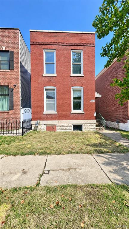 Welcome to 5647 Reber Place, a two-story brick home offering a great renovation opportunity in the Southwest Garden area. This investor special features approximately 1,318 sq. ft., original hardwood floors, tall ceilings, historic millwork, large windows, a vintage clawfoot tub, full walk-out basement, and central A/C equipment. The property needs extensive renovation throughout, including the kitchen, bathroom, ceilings, walls, flooring, and finishes. A deep backyard adds additional potential. Neighboring renovated homes have sold for over $500,000, highlighting the upside for the right investor. Conveniently located near The Hill, Tower Grove Park, Missouri Botanical Garden, restaurants, shopping, and I-44. Property is being sold AS IS.