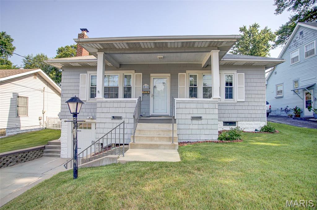 Charming 2-bedroom, 1.5-bath bungalow in Alton offering comfortable, move-in-ready living with thoughtful updates and buyer-friendly extras. The inviting shake-sided exterior and welcoming front porch create great curb appeal from the moment you arrive. Inside, the home features convenient main-level laundry, luxury vinyl plank flooring throughout the kitchen, dining room, and laundry area, plus cozy carpet in the living room and bedrooms. The kitchen comes fully equipped, and all appliances stay—including the washer and dryer. The refrigerator and washing machine were both new in 2026, while the water heater was replaced in 2022. Outside, enjoy a fenced backyard with space for pets, play, gardening, or entertaining, along with a storage shed for lawn equipment and seasonal items. For added peace of mind, the seller is offering a 14-month home warranty for the buyer. A great opportunity to enjoy easy, practical living in Alton!