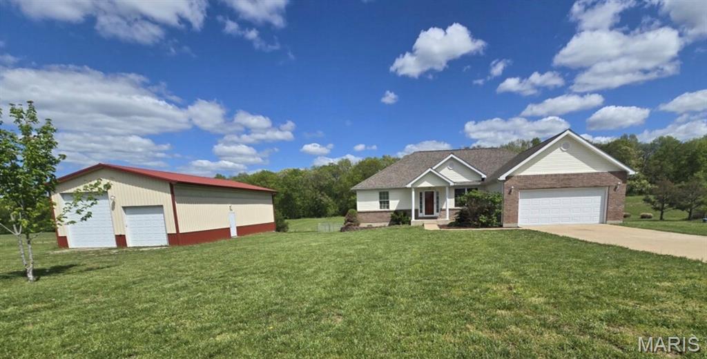 Beautifully maintained home located in the desirable Farmington School District, offering space, comfort, and scenic surroundings. Situated on a beautiful, level 3 acres, this property provides the perfect blend of open space and privacy. The inviting living room features a cozy propane fireplace and large rear-facing windows that showcase peaceful views—perfect for enjoying wildlife, outdoor gatherings, or quiet evenings. The main level includes 3 bedrooms and 2 full baths, highlighted by a spacious primary suite with a large walk-in closet and private bath. The finished walk-out basement adds incredible flexibility with an additional bedroom and full bath, offering the potential for a separate living space or in-law suite—with room to expand into a full kitchen area if desired. Car enthusiasts or hobbyists will love the impressive 30x50 detached garage, already plumbed for an additional bathroom and featuring an oversized door ideal for RV storage.
Step outside and enjoy a beautiful setting complete with multiple mature fruit trees (apple, pear, peach, & cherry), creating the perfect backdrop for gardening, wild life watching, outdoor entertaining, or relaxing around a fire pit. Located in a highly sought-after area—this is truly a must-see property. Schedule your showing before it’s gone!