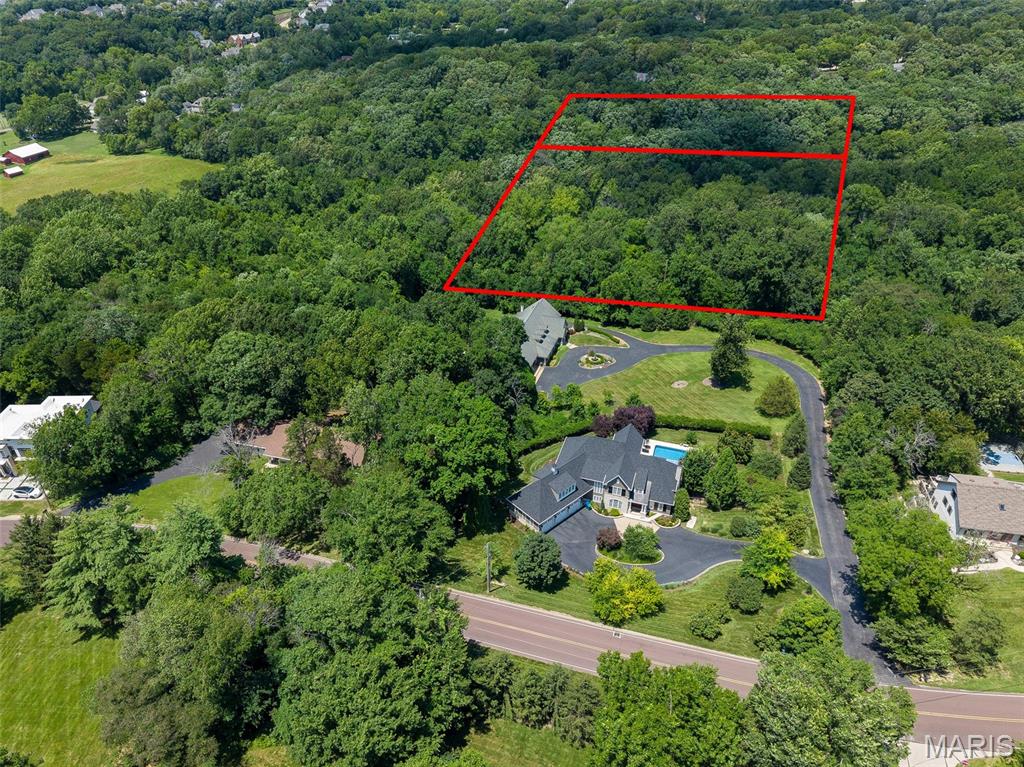 8 acres in the municipality of Sunset Hills! Secluded and private acreage to build your dream home. The wooded land is a combination of mostly level and gently rolling terrain. Access to property by easement from Weber Hills Rd. Located in the sought-after Lindbergh school district and conveniently situated near shopping, restaurants, parks, and major highways, this is an exceptional property.