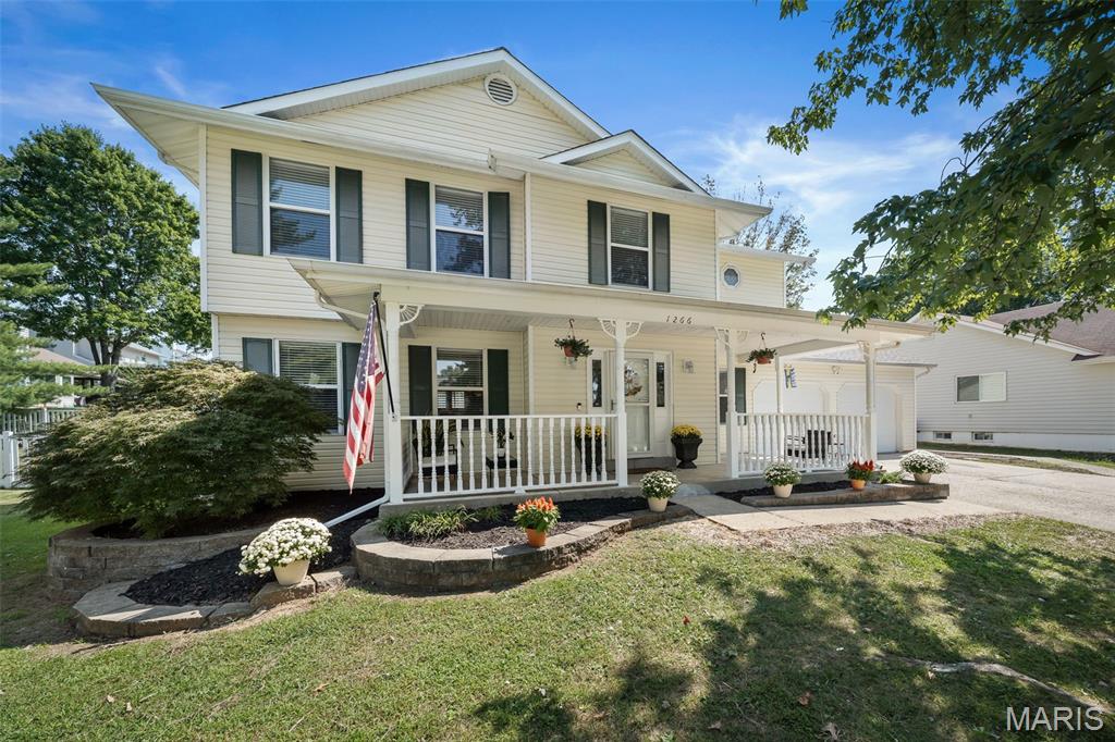This spacious 4 bedroom, 2.5 bath two story in the desirable Meadowridge community offers over 2,100 sq. ft. of living space, a 2 car garage, a full basement, and a large fenced backyard all, just a short walk from Veterans Tribute Park.

Inside, hardwood floors flow throughout the main level, and the inviting great room features a wood burning fireplace framed by floor to ceiling built in bookshelves. The kitchen and breakfast area overlook the backyard, offering plenty of room for outdoor entertaining, play, pets, or simply relaxing at home.

Upstairs, the primary suite includes two closets and a private bath with dual sinks, a soaking tub, and separate shower. Three additional generously sized bedrooms and a full hall bath provide plenty of flexibility for bedrooms, guests, or a home office.

Need even more space? The full unfinished basement offers abundant storage and room to create additional living, recreation, workout, or hobby space.

Meadowridge offers a neighborhood pool and clubhouse, two ponds, and easy access to shopping, schools, libraries, and major highways. Even better, Veterans Tribute Park is accessible from the neighborhood, putting trails, playgrounds, fishing lakes, a dog park, and more practically in your backyard.

If you’ve been searching for a 4 bedroom home in St. Charles with space to grow, a fenced yard, neighborhood amenities, and an incredible location, this one deserves a closer look.