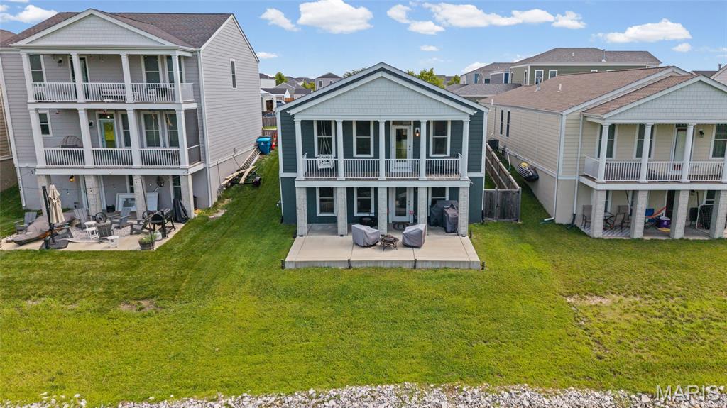 Rare opportunity to own a waterfront ranch home on a premium lot in the highly sought-after New Town at St. Charles community. Perfectly positioned overlooking the scenic canal and adjacent walking trail, this 3-bedroom, 2-bath home offers approximately 1,600 square feet of thoughtfully designed living space combined with picturesque water views and an unbeatable location. Built in 2021, the home features an open-concept floor plan that seamlessly connects the kitchen, dining, and living areas, creating an ideal space for both everyday living and entertaining. The spacious primary suite includes a private bath and generous closet space, while two additional bedrooms provide flexibility for guests, a home office, or family living. A full basement offers abundant storage and future finishing possibilities, and the attached two-car garage adds convenience. Step outside on the oversized patio or deck and enjoy one of the home's most distinctive features: a premium waterfront homesite with tranquil canal views and direct access to the neighboring walking trail, providing a beautiful backdrop for morning coffee, evening strolls with sunset views, and outdoor enjoyment. Residents of New Town enjoy access to lakes, parks, canals, restaurants, shops, community pools, and year-round events, creating a true walkable lifestyle unlike any other in St. Charles County