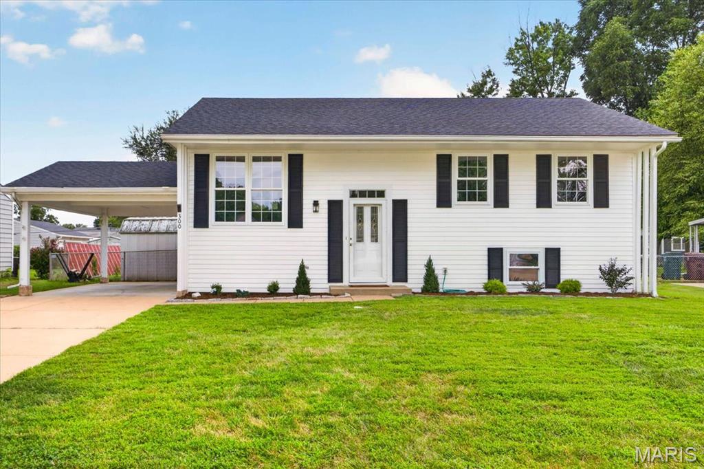 Welcome home to this completely renovated split-level home in Fenton! From the moment you arrive, you’ll appreciate the manicured lawn, new landscaping, and convenient two-car carport. Step inside to a bright, inviting interior filled with natural light, fresh paint, new ceiling paint, updated doors and trim, and luxury vinyl plank flooring throughout.

The main-level family room flows seamlessly into the completely updated kitchen, featuring crisp white cabinetry, stainless steel appliances, and easy access to the sunroom, perfect for enjoying your morning coffee or relaxing year-round. Three comfortable bedrooms and a beautifully updated full bath complete the upper level.

The finished lower level offers even more living space with an additional family room, a fourth bedroom, full bath, and ample storage. Outside, enjoy the fenced backyard complete with storage sheds, offering plenty of space for entertaining, gardening, pets, or play.

Ideally located near Riverside Golf Course, Fenton City Park, shopping, dining, and everyday conveniences, this move-in-ready home combines thoughtful updates with flexible living space in a fantastic location. There’s nothing left to do but move in and enjoy!