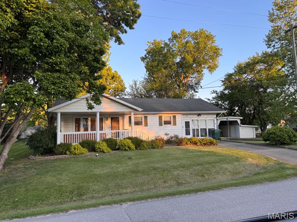 Three (or 4) bedroom, 2.5 bath home on three spacious lots (just under 1/2 acre) in the center of town.  Lovely curb appeal and multiple spaces to enjoy your morning coffee, evening drinks, and entertaining friends and family!  Backyard patio you can access by your private bedroom sliding doors or off of enclosed glass/screen 3 seasons room (make it year round by installing a mini-split. ) Covered front porch. Shade trees for cooling in summer heat and sunny spots for a garden, mature landscaping. Two garages, large carport and garden shed provide places for hobbies and storage. New roof recently contracted and waiting on installers to schedule. This one-owner home  now ready for a new family!
Have your preapproval? Schedule your showing today! Need assistance getting connected with a lender - just ask!