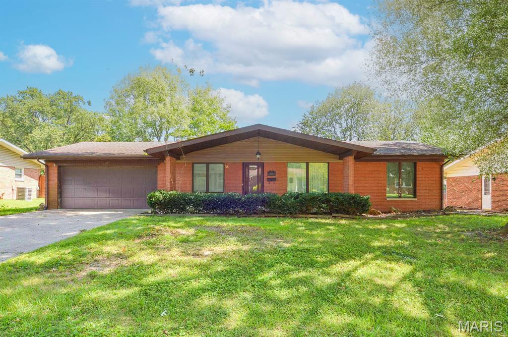 Price listed is Starting Bid Only. Bidding starts closing 9/30/2026 @ 6 p.m. Nestled within the established Canterbury Manor neighborhood, this well-maintained brick ranch offers 3 bedrooms, 2 bathrooms, an attached two-car garage, and a full basement in Belleville! The spacious main level welcomes you with a large front living room featuring oversized windows that fill the space with natural light. Just across the hall, the formal dining room flows seamlessly into the generously sized kitchen, complete with a cozy breakfast nook, ideal for casual dining and everyday meals. Beyond the kitchen, the large family room serves as a comfortable gathering space, anchored by a wood-burning fireplace and offering access to A covered poured-concrete patio overlooking the partially fenced backyard. Two generously sized bedrooms share a conveniently located full bathroom, while the primary suite provides added privacy with a spacious walk-in closet and private bathroom featuring a walk-in shower. The unfinished basement offers excellent potential for future customization by additional living space, recreation, or storage. Conveniently located near area schools, IL-161, and just minutes from the Belleville Public Square, this property combines comfortable living with a convenient location.  Property will sell under auction terms and be sold AS- IS, WHERE-IS. Seller, will not make any repairs as a result of any building, occupancy, or environmental inspections. Buyer will be required to sign an Auction Purchase & Sale Agreement if final bid is accepted by Sellers.