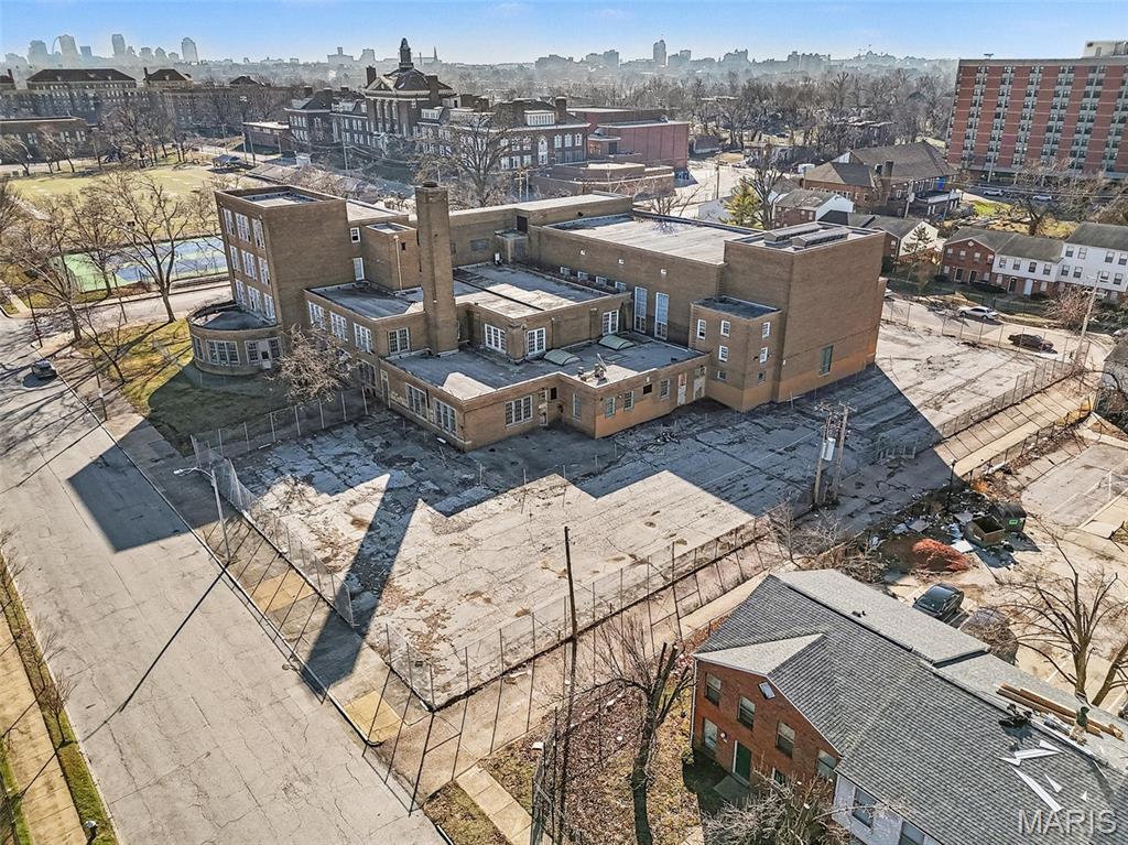 This Turner Middle School property offers a unique opportunity to acquire a prominent urban school site in St. Louis City. The building encompasses approximately 64,565 square feet on a 0.99-acre lot and is ideally suited for redevelopment or adaptive reuse. Constructed in 1939 with brick construction and a flat roof, the property provides a solid structural foundation for a variety of potential uses.
The property is located within the St. Louis City submarket and benefits from strong urban access, including proximity to local roadways and surrounding community amenities. The site sits in a moderate-to-low flood risk area, offering additional security for future investment. Turner Middle School is currently owned by the Board of Education of the City of St. Louis, presenting a rare chance for investors, developers, or organizations to repurpose a large-scale educational facility in an established neighborhood. SLPS
