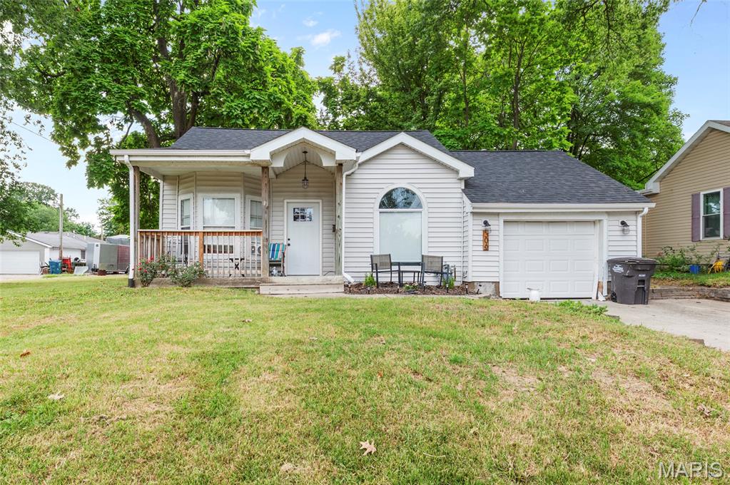 Welcome home to this charming, move-in ready 2-bedroom, 2-bath home located in the highly sought-after Triad School District! Featuring a neutral color palette throughout, this well-maintained home offers a warm and inviting family room, a spacious office perfect for working from home or a hobby space, and a bright eat-in kitchen filled with natural light and newer appliances. The primary suite includes a walk-in closet and large private bath, while the second bedroom is  situated near the full hall bathroom. Spacious laundry as well as an attached garage! Nice sized backyard with a deck, perfect for enjoying the fresh air and BBQ's. Conveniently located close to shopping, dining, and everyday amenities, this adorable home is ready for its next owner. Roof, HVAC, appliances, etc all new within the last 4 years. Seller to make no repairs. Call today to schedule your personal tour!