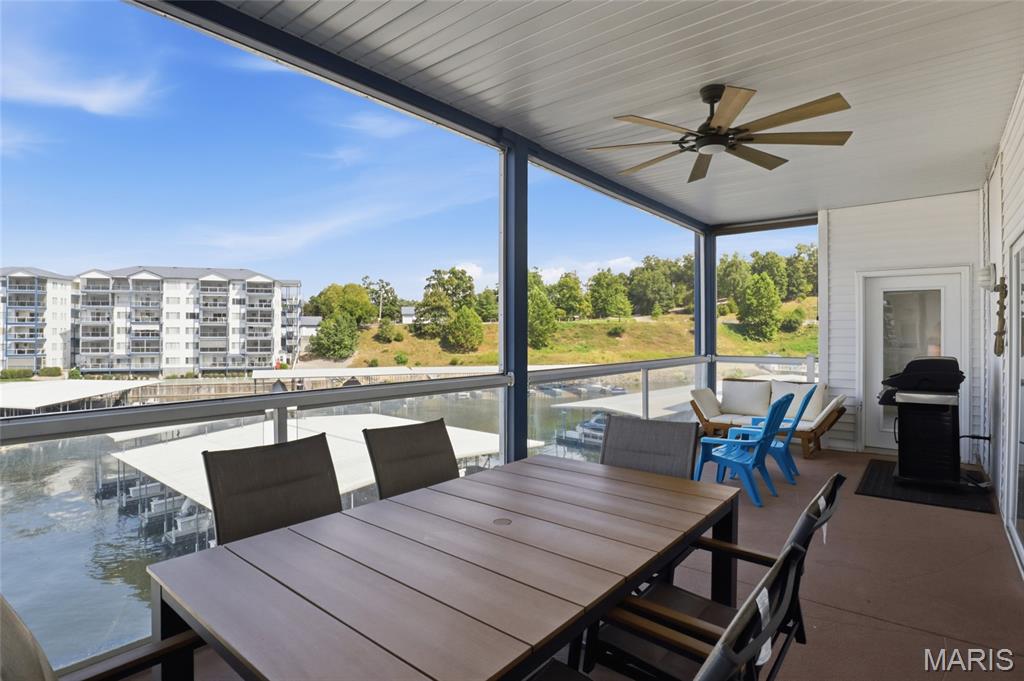 BIG VIEWS, BIG BOAT SLIP & TURNKEY LAKE LIVING! Experience the ultimate Lake of the Ozarks lifestyle from this beautifully updated end-unit condo at Monarch Cove, perfectly positioned at the 2MM with spectacular lake views. Designed for effortless lake living, this spacious retreat features NEW flooring, NEW lighting, NEW kitchen appliances, plus a NEW washer and dryer. The open-concept living area is warm and inviting with granite countertops and a gas fireplace, while the screened-in deck with Plexiglass inserts easily transforms into a 3-season room--perfect for morning coffee, sunset cocktails and year-round enjoyment. Even better, this TOTAL LAKE PACKAGE includes a highly desirable 14x40 boat slip PLUS PWC slip! Offered TURNKEY, this condo is ready for immediate enjoyment, a vacation getaway or income-producing investment with NIGHTLY RENTALS ALLOWED. The end-unit location near the elevators adds convenience and privacy. Just off Duckhead Road and minutes from the historic Bagnell Dam Strip, shopping, restaurants, entertainment and popular waterfront destinations by land or water. Resort-style lake living starts here--bring your bags, boat and lake dreams! Lake life starts here!