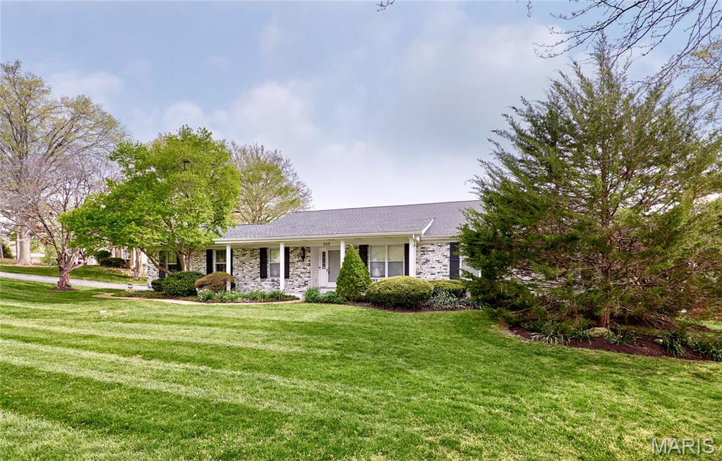 Beautifully renovated 4BR, 3Bath ranch with over 3300 sq ft of living space on a tree-lined street is waiting for new tenants to call it home. Hardwood floors throughout the main level. Eat in Kitchen w/ 48" cabinets, granite tops, subway tile back splash and stainless appliances. Open floor plan, vaulted great room w/ gas fireplace and exposed wood beams, living room and dining room off entry foyer both w/ crown molding. Large master suite with walk in closet, updated master bath with dual vanity and ceramic surround shower. 2 more large bedrooms, full bath and main floor laundry complete the first floor. Finished LL almost doubles your living space with 2 large rec rooms, Large 4th bedroom and full bath w/ jacuzzi tub. Tons of storage space, 2 car garage, fenced backyard, and more to offer in this great Chesterfield location, close to highways, shopping and highly rated Parkway Schools. Pets require approval and additional fees. Rental amount includes professional lawn care and landscaping. Hurry, this one won't last!