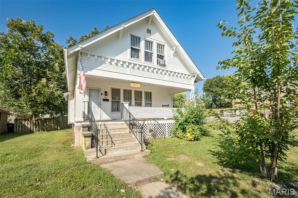A Rare Find in Elsberry! Charming, character-filled homes like this one don’t come along often—especially under $200,000! This delightful home offers three exceptionally large bedrooms, wonderfully tall ceilings, and beautiful millwork craftsmanship that simply isn’t found in today’s cookie-cutter construction. Every room has a sense of character and charm that makes this house feel truly special.

One of the spacious upstairs bedrooms opens to a wonderful three-seasons room, offering a peaceful spot to enjoy your morning coffee, curl up with a book, or take in the changing seasons. Outside, you’ll love the large fenced backyard, providing plenty of room for gardening, entertaining, pets, or simply enjoying some time outdoors. And the inviting front porch is just begging for a couple of chairs and a summer evening spent relaxing.

Conveniently located in Elsberry with easy access to local amenities, this is a home with personality, space, and old-fashioned craftsmanship—all at a price that’s increasingly hard to find. If you’re looking for something with charm and character instead of cookie-cutter, this one deserves a look!  COMES WITH A 2 YEAR HOME WARRANTY