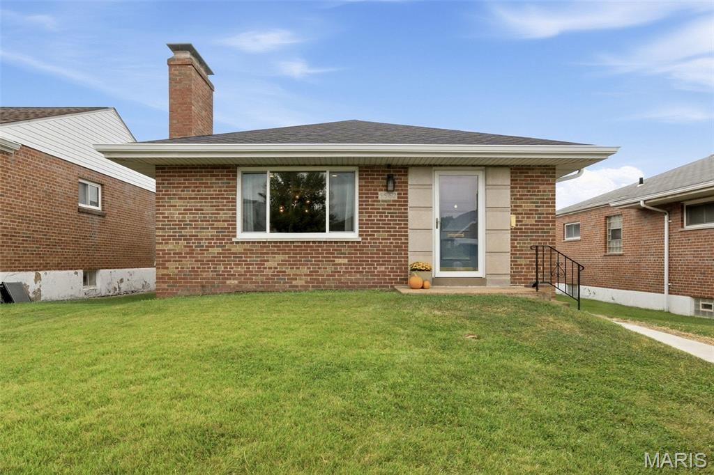 This beautifully updated 1,125 SF home blends modern upgrades with classic charm in a highly convenient location. Completely renovated in 2020, the home has been thoughtfully improved and meticulously maintained, featuring updated plumbing (2020), HVAC (2020), hot water heater (2020), a new roof (2024), Pella windows (2025), and new gutters, concrete walkway, and side pad (2026).

Inside, you'll find two comfortable bedrooms, a full bath, beautiful real hardwood floors, built-in bookshelves, and a stunning modern kitchen designed with both style and functionality in mind. A large walk-in pantry provides exceptional storage, while the bright, refreshed living spaces make the home feel warm and inviting throughout. Kitchen appliances, along with the washer and dryer, and basement refrigerator are included with the home, making it truly move-in ready.

Additional highlights include a 1-car garage, inviting sunroom, walkout basement with built-in storage shelving, and a large concrete patio perfect for entertaining. A built-in firepit area creates the ideal setting for relaxing evenings outdoors.

Ideally situated within walking distance of Tilles Park and convenient to nearby shopping, dining, and amenities, this home offers an exceptional combination of character, thoughtful updates, and everyday convenience.

Move-in ready and meticulously maintained—don't miss this opportunity!