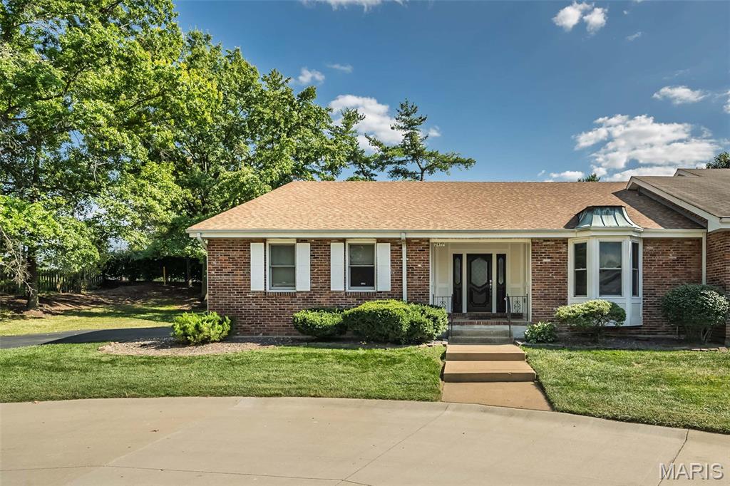 Beautiful Renovation in the sought-after Woodfield Villa Community! This 2 bed 2.5 bath ranch boasts LVT flooring throughout!   Enter into a spacious foyer that brings you into a home that is set up for ease of living & entertaining. First, THE KITCHEN!  Chef's Kiss! Large island with sink, stainless appliances, quartz counters, modern tile backsplash,  custom cabinetry & tons of storage. The LR & DR open to each other for ease during family gatherings.  LR has a vaulted ceiling, a gas fireplace & sliding glass door to the patio outside. Down the hallway, you'll find a newly updated hall bath & second bedroom . The Primary suite has a tray ceiling,  large walk-in closet & a spa like en-suite bath with double sink vanity, walk in shower with new tile floor and surround making this a true retreat.   When you head downstairs, you'll find a dry bar, FR/Rec Room space -great for movie/game nights-  a half bath & flex room that can be used as an office or home gym!  This one has it all!