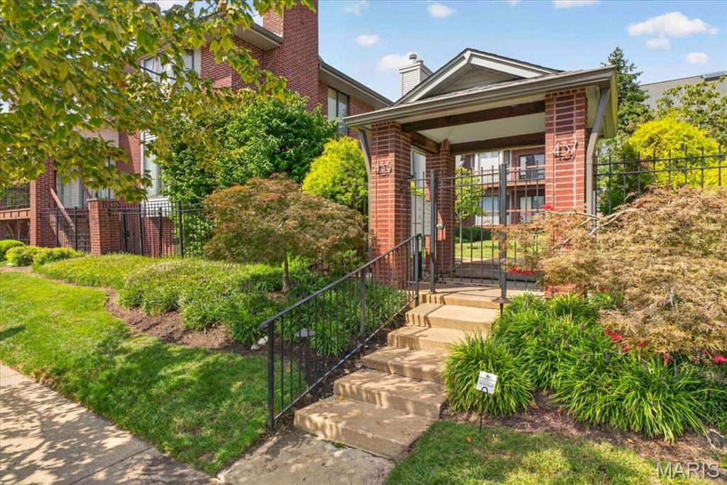 Discover a rare blend of style, space, and effortless city living in this beautifully refreshed 2-bedroom, 2 and a half bathroom condominium within a private gated community in the highly sought-after Skinker-DeBaliviere neighborhood. This inviting second-floor residence is filled with natural light and distinctive details, including a spacious loft with an oversized retractable skylight—an extraordinary space that can be transformed into a refined home office, creative studio, lounge, or private retreat.

The thoughtfully designed interior features an open floor plan that includes a warm fireplace, fresh paint throughout, and new carpeting on the stairs. The spacious master suite offers a generous walk-in closet and beautifully updated ensuite bath. Upstairs, a dedicated laundry area accommodates a full-sized washer and dryer, both included.

Step outside to your private deck and enjoy the peace and privacy of this exceptional setting. A new roof adds peace of mind, while the tandem garage and storage beneath the unit provide the convenience and functionality that discerning buyers appreciate.

The location is truly exceptional. Forest Park and MetroLink are just a short walk away, while Washington University, the BJC medical complex, Central West End, and the University City Loop are all within easy reach. With quick access to Highway 40, Forest Park Parkway, and I-170, the best of St. Louis is right outside your door.