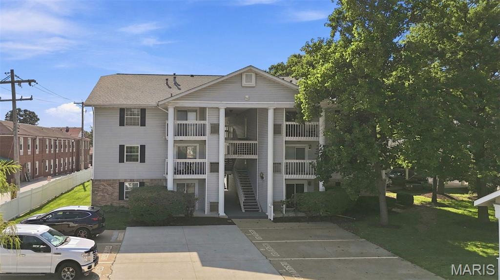 Welcome to carefree condo living in highly sought after Kirkwood at a great price!  This updated 2 Bedroom, 2 Bathroom condo is walkable to everything Kirkwood has to offer, and also conveniently located to the rest of St. Louis, with bus lines and highways nearby.  Unit 202 is located on the second level at the back of the building, away from Kirkwood Road.  Enjoy covered, open air access to your front door.  The natural light-filled Living Room features laminate wood flooring and a newer sliding door to your private balcony.  The eat-in Kitchen boasts white cabinets and granite counters with subway tile backsplash and stainless appliances.  There are two nicely sized bedrooms, both with double closets, updated windows, laminate flooring and ceiling fans.  Don’t need two bedrooms?  Use one of them for your home office!!  Enjoy in unit laundry with the washer and dryer staying in the unit.  There are two additional hall closets, plus an additional storage unit downstairs.  An assigned parking place makes coming and going a breeze.  Furnace and A/C in 2018.  Kitchen refrigerator and washer/dryer stay with the unit, as is, but working well at time of listing.  Kirkwood Occupancy Inspection is complete.  Move right in and make yourself at home!