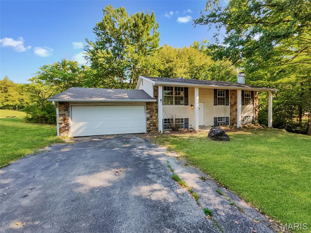 Welcome to this 3-bedroom split-level home situated on a spacious 0.77-acre lot. The property offers a functional layout with comfortable living space and plenty of room to enjoy the outdoors. The generous lot provides privacy, flexibility, and opportunities for outdoor entertaining, gardening, recreation, or future improvements. A great opportunity for an owner-occupant or investor looking for a home with a larger-than-average lot and plenty of potential. Schedule your showing today!