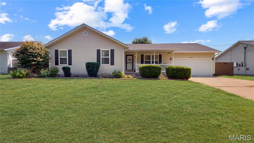 Welcome to this charming 4-bedroom home, where flexible spaces, thoughtful updates, and a spacious backyard come together to create a peaceful place to call home! You’ll love the welcoming front porch—perfect for sipping your morning coffee and taking in the friendly neighborhood surroundings. Inside, you’ll find a spacious living/dining area that offers plenty of flexibility for entertaining or creating a space that fits your lifestyle. Continue into the well-appointed kitchen, which flows seamlessly into the bright and open family room. Just beyond the glass doors, a huge fenced-in backyard awaits—ideal for BBQs, family gatherings, and outdoor play. Your four-legged family members may just be the ones begging you to make this one yours! Retreat to your primary suite, complete with a walk-in closet featuring custom shelving and a private en-suite bathroom with a shower/tub combination. Down the hall, you’ll find three additional bedrooms and a full bathroom, creating a comfortable and private layout with room for everyone. This home also offers numerous updates, giving you peace of mind for years to come; Refrigerator (2024), HVAC (2024), Disposal (2021), Bedroom carpet (2021), Fence (2021), Garage door and motor (2019), and more! With its inviting layout, spacious yard, comfortable bedrooms, and long list of updates, this home is ready to welcome its next owners. Come see all that it has to offer!
