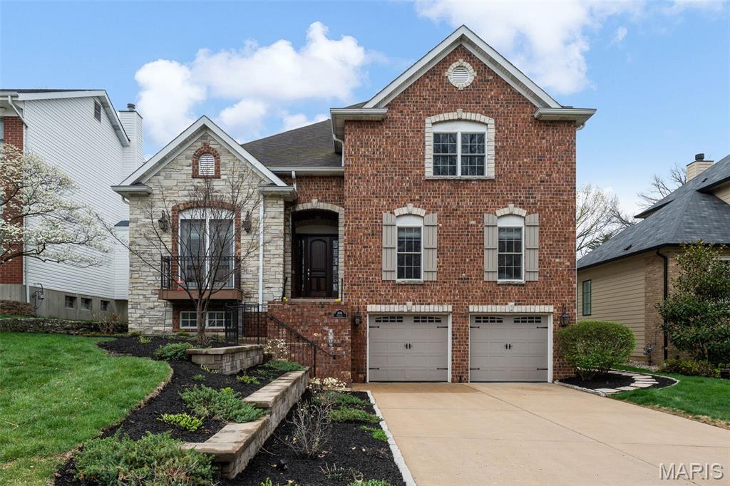 This stately home built in 2006, boasts 4 bedrooms and 5 full baths and is conveniently located within walking distance to downtown Clayton. The exterior showcases a brick and stone facade adorned with gas lanterns and shutters. Inside, the foyer has a grand two story staircase with wrought iron railings and opens to a gorgeous formal living and dining area. The thoughtfully laid out chef’s kitchen features island seating, tons of storage, several work stations, and opens to the breakfast room area. The family room has a large gas fireplace and opens to the backyard. A guest suite, laundry room, and full bath complete this level. Upstairs you will find the primary suite that has a private deck and a luxurious bathroom featuring a large shower, oversized soaker tub, and generous walk-in closet. Additionally there are two en-suite bedrooms on this level. The lower level features a recreation room, full bath, sauna, and 3 car tandem garage. The inviting backyard has a private screened-in porch, deck, generous sized patio and is fully fenced. Don’t miss this one!