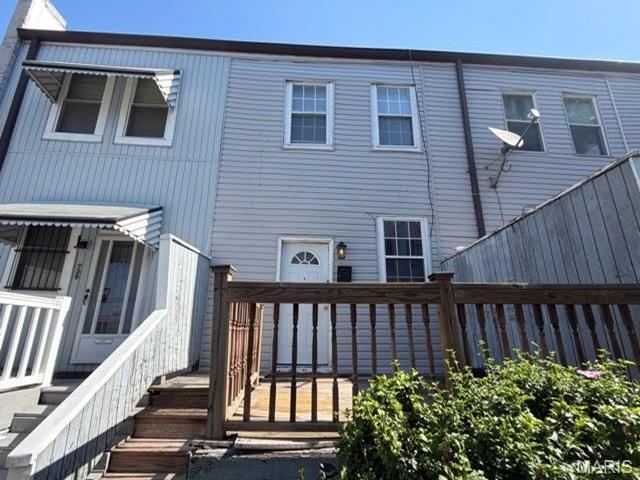 Built in 1895, this charming townhome offers 2 bedrooms, 1 bathroom, and approximately 1,046 square feet of living space. Full of character, the home features a functional layout with comfortable living areas and plenty of potential to make it your own. Needs updates and repairs to make move-in ready! AS IS Auction property.
