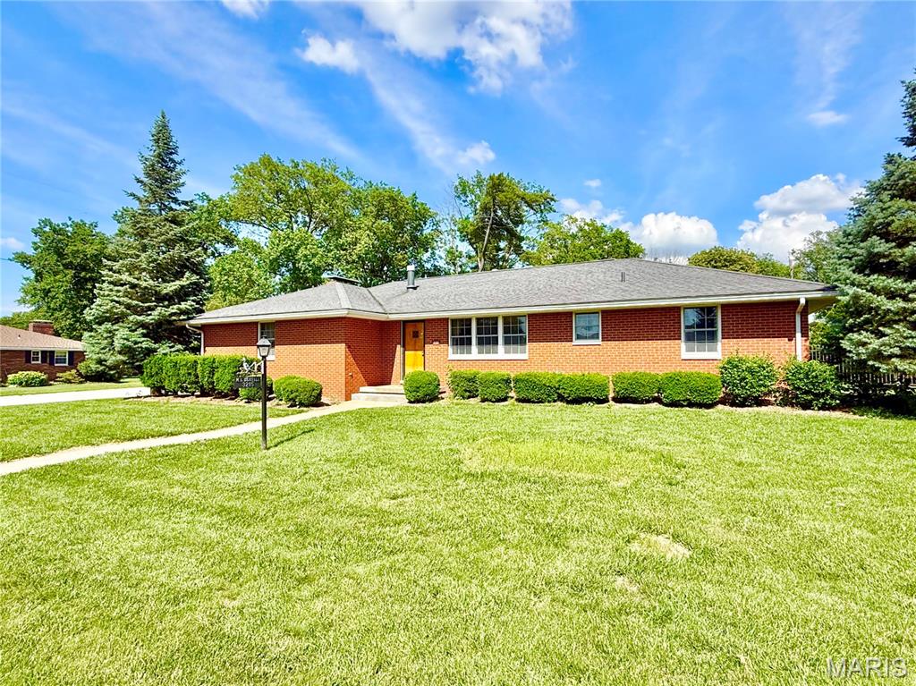 Welcome to this beautifully maintained one-owner home in the desirable Greenwood Meadows neighborhood of Godfrey — just a short walk from the community pool and situated on a gorgeous corner lot in this well-established subdivision. Custom built by it's one and only owner, Beuttel Construction, this all-brick ranch showcases the quality craftsmanship and timeless character they were known for. 

Offering 3 bedrooms and 2 baths, this home features a flexible floor plan with the third bedroom currently serving as a formal dining room, complete with glass doors leading to a nice deck overlooking the gorgeous level backyard. Situated on a corner lot, the property also includes a side-entry attached 2-car garage for added curb appeal.

Inside, you’ll find a warm and inviting family room/den highlighted by a stunning fireplace and bowed window, along with many original features that add charm and personality throughout — including pristine blue bathroom tile, elegant coved ceilings, and a distinctive fanned ceiling design. Furnace and AC replaced in 2022.