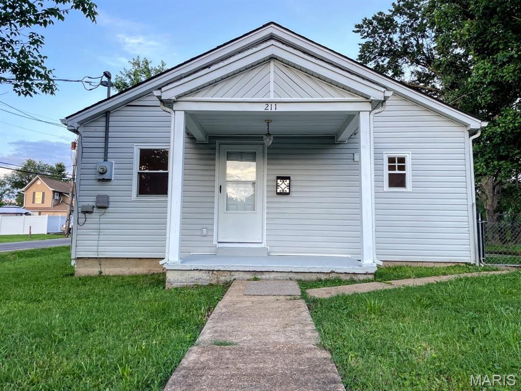 This home may be the one to check off all the boxes: 3 bedrooms, fenced in yard, detached workshop, and new, well-designed interior.  It is tastefully refinished with luxury vinyl plank flooring, carpet in bedrooms, new light fixtures throughout the home, new counter tops, high-end stainless-steel appliances, new bathroom fixtures, and a vaulted living room ceiling.  Don't forget the brand-new roof and modern vinyl windows. Have kids?  Guess what, it's located within walking distance of city pool and new playground.  
Pets aren't a problem with the large fenced-in back yard.  
Off street parking. Paver patio. Forced air heating cooling.  
There is a lot to love about this cute home.
