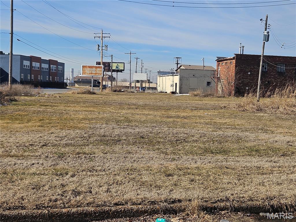 This residential lot offers an opportunity to build in a highly visible and convenient area just steps away from the city's main street. Flat and accessible, this lot is well suited for new construction and benefits from nearby utilities and established infrastructure. Ideal for a single family residence, townhouse, or mixed-use concept if permitted. Enjoy easy access to major highways for a quick commute to St. Louis.