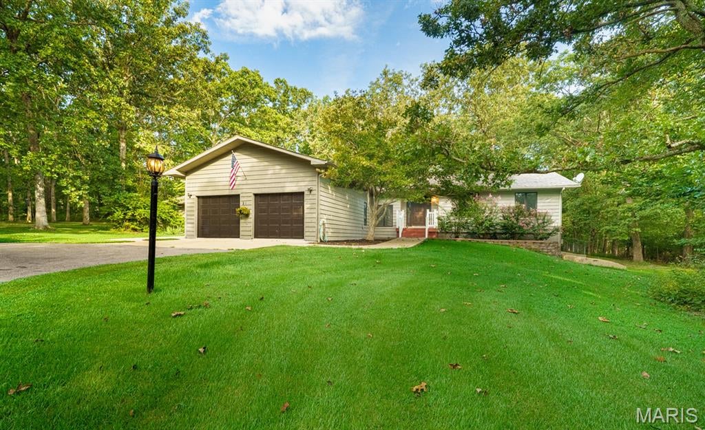 Welcome to this stunning, must-see home situated on approximately 2.3 acres (m/l), offering more than 3,600 square feet of living space and a rare indoor pool.

This spacious home features 4 bedrooms, 4 bathrooms, stainless steel appliances, granite countertops, a large kitchen island, solid wood cabinetry, and a separate formal dining room. The open floor plan is complemented by updated flooring throughout, creating a warm and inviting atmosphere.

The finished lower level provides additional living and entertaining space. Step outside to enjoy the large backyard patio, beautifully landscaped lawn, mature trees, fenced backyard, and peaceful park-like setting. A circular driveway adds curb appeal and convenience.

This exceptional property offers space, comfort, and unique amenities. Schedule your private showing today!

Agent-Owned