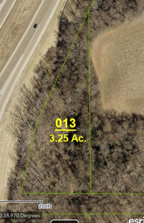 This wooded, raw parcel is perfectly situated just off I-55 at Exit 37 (Livingston-New Douglas), ideally located halfway between St. Louis, MO, and Springfield, IL. The land is densely covered with mature trees, offering natural privacy and a secluded atmosphere. Access is via an undeveloped-overgrown road, adding to the rustic charm and sense of solitude. The property borders the Northbound on-ramp of Interstate-55, providing excellent visibility and easy access while maintaining a quiet, natural setting. Zoned residential, it’s an ideal spot to build a custom home, vacation retreat, or hobby farm. Utilities are not currently on-site and their availability will need to be verified by the buyer, though Seller states nearby connections are possible. This location offers a balance of country living with convenient access, making it a rare opportunity for buyers seeking privacy, natural beauty, and investment potential near major highways