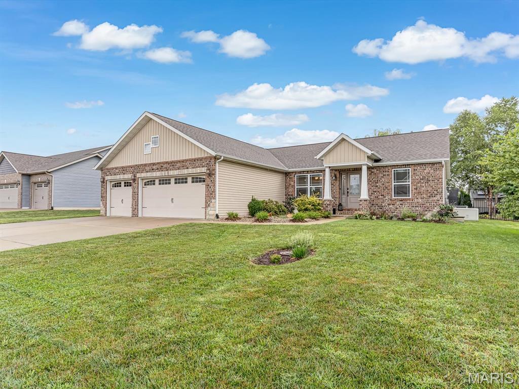 Welcome to this beautiful 4-bedroom, 3-bath home in Troy, offering the space, updates, and features buyers are looking for! Step inside to an inviting open-concept main level where tall ceilings and a fireplace create an impressive focal point in the spacious living area. The kitchen flows seamlessly into the living space and features both a designated dining area and breakfast nook, making the layout perfect for everyday living and entertaining. The spacious primary suite offers a private retreat with a large walk-in closet and an en-suite bath featuring a double vanity, a soaking tub, and a separate shower, while the main-floor laundry adds everyday convenience. The partially finished basement provides even more room to spread out with a large recreation room, wet bar, fourth bedroom, and full bathroom, plus a large storage room and separate utility room. The basement has also been waterproofed and is equipped with two sump pumps. Recent improvements provide even more value, including a new A/C installed in May 2026 with a 10-year parts warranty and labor warranty through March 2027. The Generac whole-house generator offers added peace of mind when you need it most. Outside, you’ll find a good-sized backyard and a spacious 3-car garage. With 4 bedrooms, 3 baths, multiple entertaining spaces, abundant storage, valuable recent improvements, and a floor plan designed for comfortable everyday living, this Troy home has so much to offer. Schedule your showing and come see it for yourself!