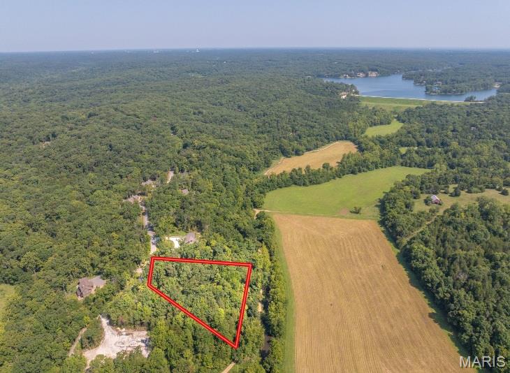 Stunning Alpine Woods lot showcasing gorgeous views of Alpine Valley. Mature Missouri hardwoods densely populate the 1.46-acre lot, offering an abundance of privacy, and the property is conveniently located just a short walk from Innsbrook's premier Alpine Lake. You'll find yourself in awe of the transcendent view this property has to offer and the uniqueness of this setting. Not only are you moments from Alpine Lake, but this property is just a short drive from Innsbrook's Charrette Creek Commons amenity complex with pool, fitness center, outdoor amphitheater, golf course, Clubhouse Bar & Grille, and more! Don't miss this opportunity to build your dream cottage in the setting you deserve! Last remaining lot with a view of Alpine Valley! Additional Rooms: In Platted Subdv.