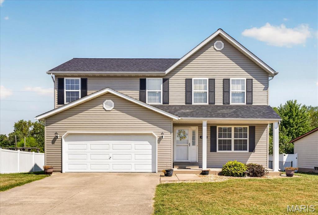 Welcome home to this spacious 3BR/2.5BA in the highly desirable Meadows of St. Jacob, located in the Triad School District. Enjoy a welcoming covered porch and a bright, open main level with a living room that flows into a separate dining room and a large kitchen with stainless steel appliances. A tucked-away half bath and main-floor laundry/mud room add everyday convenience. Exit outside to your two-tier deck overlooking a large fenced backyard—perfect for pets, play, and entertaining—plus an 18-ft round pool for summer fun. Upstairs features a generous bonus room, a primary suite with a walk-in closet, and two additional well-sized bedrooms. The unfinished basement offers room to grow or customize to your needs. Major updates include: roof (2 yrs), water heater (2 yrs), sump pump (2 yrs), HVAC (2026). Minutes from parks, schools, dining, shopping, and easy highway access. A fantastic opportunity in a sought-after community.