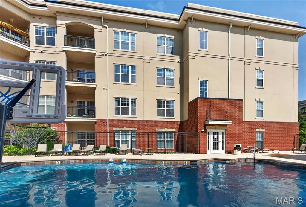 Beautifully maintained 2 bed, 2 bath top-floor condominium in the highly sought-after Hanley Station community! This light-filled residence features an open floor plan with soaring 9' ceilings, granite countertops, stainless steel appliances, in-unit laundry, spacious bedrooms with walk-in closets, a private balcony and secure garage parking. Enjoy resort-style amenities including two pools, hot tub, fitness center, clubhouse, elevators, controlled access, private storage and beautifully maintained grounds. HOA includes high-speed internet, cable, water, sewer and trash. Ideally located in the heart of Brentwood, just minutes from Clayton, Downtown, Washington University, major hospitals, shopping, dining, parks, Metrolink and easy access to Highways 40, 44 and 170. Exceptional convenience, outstanding amenities and carefree living make this an opportunity you won't want to miss!