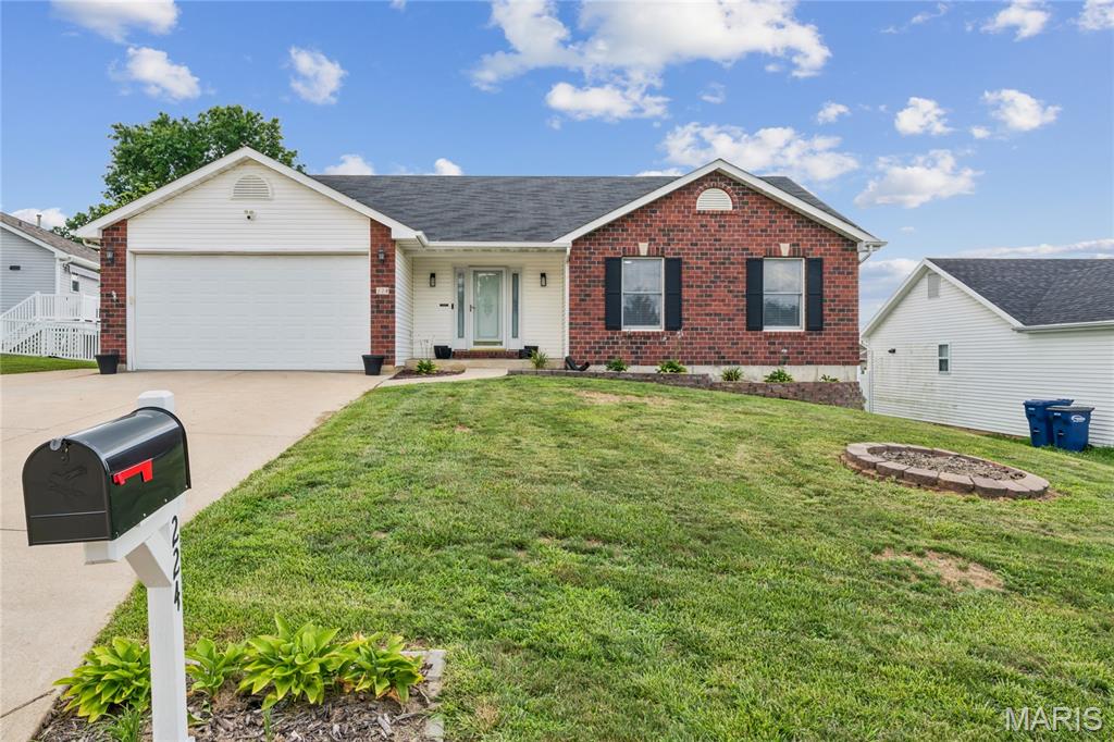 Welcome home to this beautifully updated 5-bedroom (2-bedroom of lower level), 3 full-bath ranch offering the perfect blend of comfort, style, and convenience! Featuring a desirable open floor plan, this brick and vinyl-sided home boasts a spacious living area with a cozy fireplace, main-floor laundry, and an abundance of natural light throughout. The updated interior includes newer flooring, refreshed bathrooms, fresh paint, modern light fixtures, and many additional improvements that make this home truly move-in ready. The finished walk-out basement provides extra living and entertaining space, while the deck overlooks a fully fenced backyard with low-maintenance vinyl fencing. A 2-car attached garage adds convenience and storage. Located in the highly sought-after Troy School District, this home offers easy access to Highways 70 and 47 and is just minutes from shopping, dining, parks, and everyday amenities. Don't miss this exceptional opportunity to own a beautifully updated home in a prime location!
