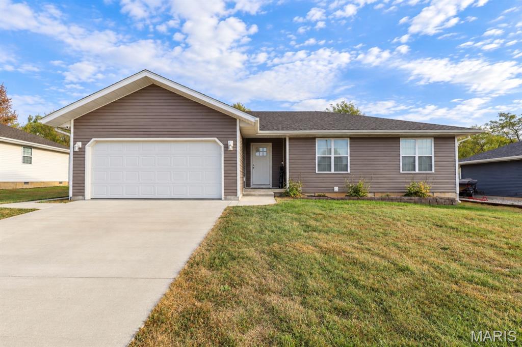 Built in 2023, this 3-bedroom, 2-bath home offers 1,496 square feet of comfortable living space with a layout that feels welcoming from the moment you walk in. The main living areas flow easily together, creating a space that works just as well for quiet evenings at home as it does for hosting friends and family. 

The home also features a 2-car garage, giving you plenty of room for parking, storage, and everyday convenience. Out back, the covered porch is a great place to start the morning with coffee, unwind at the end of the day, or enjoy the backyard in any season. The yard offers a nice amount of space without feeling overwhelming.

Located in a sought-after neighborhood close to shopping, schools, and everyday amenities, this home gives you the benefit of a newer build in a convenient location. If you’ve been looking for a move-in-ready home with comfortable spaces inside and out, this one is worth seeing in person.