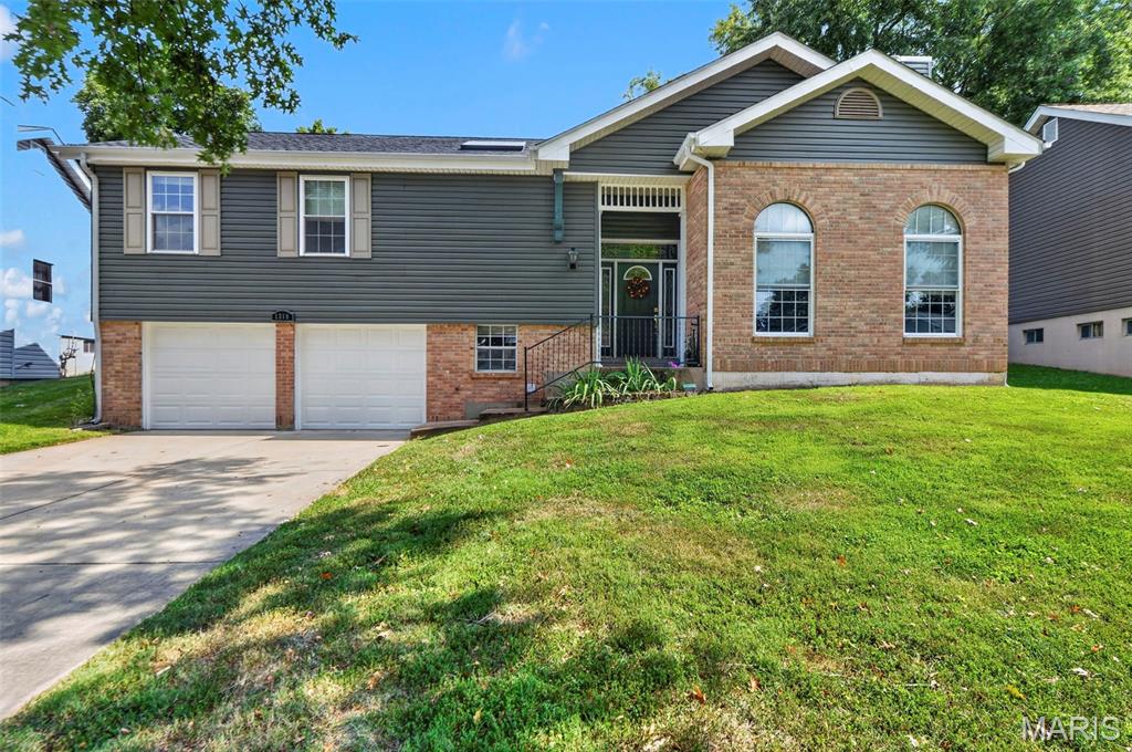 Welcome home to this spacious 4 bedroom 2 bathroom property offering 2,254 square feet of comfortable living space! This hone has been thoughtfully updated with a new roof, new siding, new HVAC, and new carpet providing peace of mind and move in ready convenience. The updated kitten offers a fresh, modern feel and plenty of space for everyday living and entertaining. Outside, enjoy a large backyard with room to relax, play or entertain. An extra-large garage provides abundant space for vehicles, storage, a workshop or hobbies. With its generous size and numerous recent updates, this home is a great opportunity you won't want to miss!