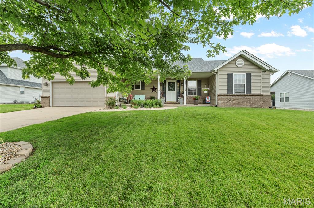 Showings begin on Friday June 26th - Welcome to 510 Creekside in Troy, Illinois! This well-maintained home offers the perfect combination of comfort, updates, and functionality. From the moment you arrive, you'll appreciate the pride of ownership throughout.  Major updates have already been completed, including a NEW roof in 2026, NEW HVAC system in 2025, and NEW water heater in 2025, giving buyers peace of mind for years to come. The beautifully remodeled kitchen was updated in 2018 and features newer cabinets, countertops, backsplash, and appliances, creating a stylish and functional space for everyday living and entertaining.  The desirable split-bedroom floor plan provides added privacy, while the spacious living areas offer plenty of room to relax and gather. Step outside and enjoy the screened-in patio overlooking the large backyard—perfect for morning coffee, evening relaxation, pets, gardening, or outdoor entertaining.  Additional features include a 2-car attached garage, attractive curb appeal, and a convenient location close to schools, parks, shopping, restaurants, and major commuting routes.  If you're searching for a move-in ready home in Troy with major updates already completed, this super cute property is one you won't want to miss. Schedule your private showing today!  Interior and Exterior audio and video surveillance.