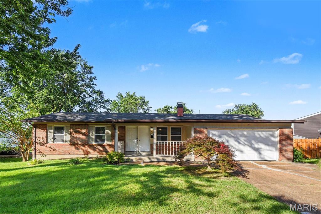 Welcome to this three-bedroom, two-bathroom home located in the North Pointe 2 neighborhood. This home features an inviting open floor plan that creates a seamless flow throughout the main living areas. The living room serves as a comfortable gathering space, highlighted by a cozy fireplace. The kitchen is fully equipped with stainless steel appliances and offers ample workspace with a unique combination of granite and Formica countertops. Downstairs, a partially finished basement provides flexible bonus space that can be tailored to fit your specific needs. Step outside to enjoy a private, fully fenced-in backyard that is perfect for relaxation or outdoor activities. Ideally situated, this property offers excellent convenience with its close proximity to everyday essentials, including local shops, grocery stores, and restaurants. Schedule your private showing today!