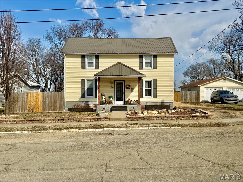 Welcome to this beautifully maintained 1.5-story home offering 3 bedrooms, 1 full bathroom, and over 1,400 square feet of living space, thoughtfully designed with comfort, charm, and functionality in mind. Blending modern updates with a cozy rustic feel, this inviting property delivers the perfect balance of character and convenience. It is perfect for any first-time homebuyer seeking a move-in ready home at a great price. From the moment you arrive, you’ll appreciate the welcoming front porch—an ideal space to relax and unwind—along with the newer landscaping that enhances the home’s curb appeal. The property provides exceptional off-street parking, featuring a front driveway, a two-car carport, and additional rear parking large enough to accommodate an RV, trailer, or extra vehicles with ease. Inside, the main level offers a highly desirable layout with the primary bedroom conveniently located on the first floor, along with the laundry area for added practicality. The spacious living areas create a warm and inviting atmosphere, complemented by a charming rustic touch that makes the home feel both modern and cozy. The kitchen is truly a standout feature, offering abundant cabinet storage, generous counter space, and newer appliances—perfect for everyday living and entertaining. Whether preparing meals or hosting guests, you’ll appreciate the functionality and openness of this well-appointed space. All bedrooms are comfortably sized, providing flexibility for family, guests, or even a home office. The main-floor bathroom is full of charm and features a classic tub/shower combination, offering both comfort and convenience. Step outside to discover an expansive fenced-in backyard designed for enjoyment and entertainment. The outdoor living area includes a covered porch, two separate large patios, and a gas fire pit—creating the ultimate setting for gatherings year-round. A children’s swing set adds to the family-friendly appeal, while a bonus storage shed provides additional space for tools, lawn equipment, or seasonal items. This home truly offers the complete package: spacious indoor living, abundant parking options, impressive outdoor entertaining spaces, and a warm, inviting aesthetic throughout. With its thoughtful layout, over 1,400 square feet of living space, and numerous amenities, this property presents an outstanding opportunity for first-time buyers looking for a well-maintained, move-in ready home at an exceptional value.