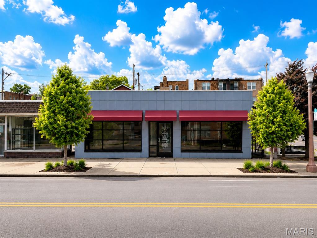 Prime South City Retail 4,000 SF, Freestanding, 18,000+ VPD and Zone F. Priced to Sell. Rare opportunity to own a freestanding, high-visibility commercial building on one of South St. Louis's most active retail corridors. Positioned on S. Kingshighway Boulevard just steps from the Chippewa intersection, one of the highest-traffic nodes in the city. This 4,000 SF building delivers the curb appeal, infrastructure, and flexibility that serious buyers demand. Striking Exterior & Street Presence The distinctive blue panel facade, bold red awning, and wide floor-to-ceiling storefront windows make this building impossible to miss at 18,000+ vehicles per day. Wide, open sidewalk apron in front creates natural customer gathering space. A neighboring Jack in the Box confirms the corridor's proven retail traffic draw. Truly Open, Column-Free Floor Plan Step inside to an expansive, wide-open main floor with high ceilings and an exposed industrial ceiling structure, a blank canvas ready for your vision. Whether you're opening a restaurant, lounge, boutique retail, salon, fitness studio, grocery, catering hall, or professional office, the layout adapts to your needs with minimal buildout. Large storefront windows on the front elevation bathe the space in natural light. High-Capacity Restroom Infrastructure Two generously sized, fully plumbed restrooms are already in place. The men's room features three urinals and a private stall; the ladies' room offers multiple stalls and a vanity. This level of restroom capacity is a significant advantage for food service, entertainment, adult daycare, or any high-customer-volume use and it's already built. Major 2023 Capital Improvements New furnace, New AC, New front windows; Updated electrical panel; New water heater, and Newer TPO roof. All completed in 2023, providing a buyer with confidence and reduced near-term capital expenditure. Additional Features Two private offices. Rear alley access with rear entry door. Street parking. Zone F Retail (broad permitted uses) Ideal Uses Include: Hookah lounge, Restaurant or bar; Retail boutique; Beauty supply or salon; Grocery or specialty food; Catering; Adult daycare; Fitness or dance studio; Professional offices; Automotive/motorcycle accessories; Event or entertainment venue. This corridor doesn't offer freestanding buildings like this often and rarely with this level of recent investment. Must see to appreciate. Schedule your showing today.
This corridor doesn't offer freestanding buildings like this often — and rarely with this level of recent investment. Must see to appreciate. Schedule your showing today.