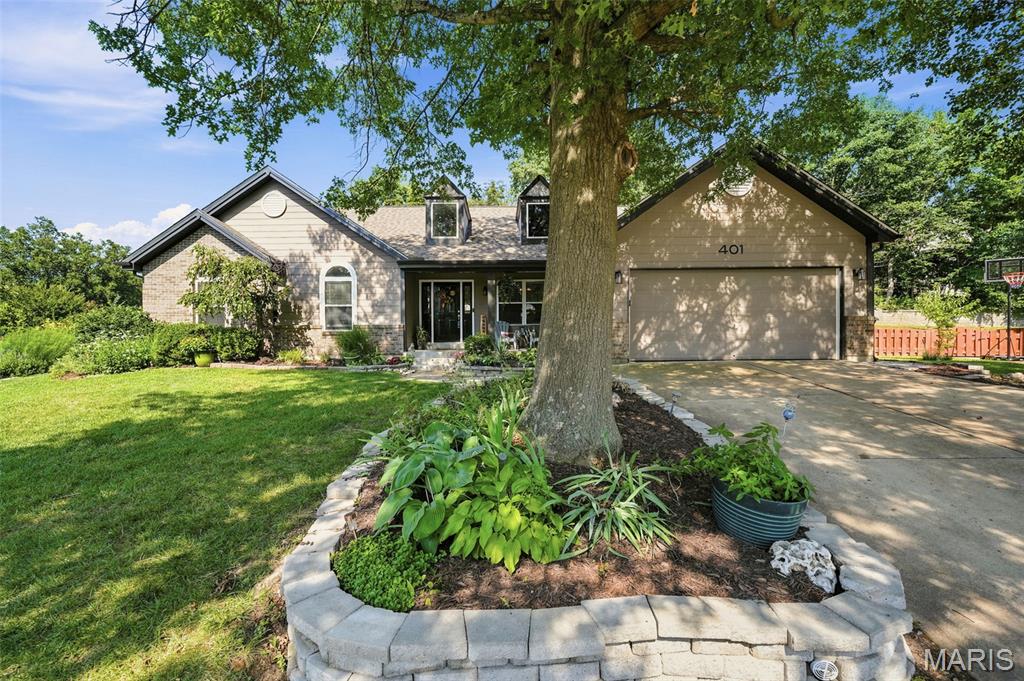 This home is absolutely FABULOUS!! Open floor plan is perfect for entertaining, easy access to a huge fenced backyard and patio! Kitchen has beautiful granite tops, newer cabinets, center island, wine rack, stainless steel appliances with glass top stove, d/w, disposal, farm sink, microwave and a pantry! Open to vaulted great room with 2 skylights--bright and light! Sitting room can be formal dining area if you'd like! Ceramic tile in kitchen, dining, and all 3 full bathrooms! Vaulted ceilings in master bedroom and spa-like bath features separate shower and soaker tub! Lower level perfect for guests or whatever your heart desires with built-in entertainment shelving, convenient sleeping room and private full bathroom! Open floor for the perfect lower level! Subdivision even comes with a club pool! Nice big back yard, with patio; great for a table with an umbrella or outdoor lounge area perfect for get togethers and BBQ setup! There is gas connection behind the stove in the kitchen if you prefer to later install a gas stove.