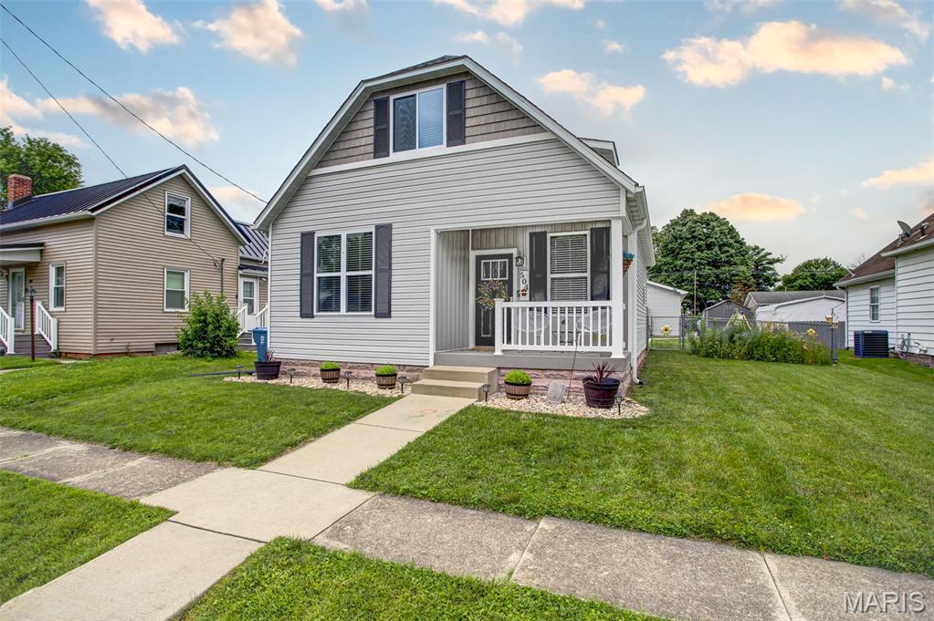 Show stopper!  Located in the highly sought-out Triad School District, this beautifully maintained  3-bedroom, 2-bathroom home offers 1,300 sq ft of move-in-ready living space, on a spacious fenced in backyard - with NO HOA.   You’ll love the peace of mind that comes with a complete renovation in 2017, including a new roof, siding, windows, doors, HVAC, electrical, plumbing and appliances!  Recent updates include a remodeled first-floor bathroom (2025) and foundation tucked-pointing and sealed in 2023. Step outside to enjoy the large concrete patio and fully fenced backyard- perfect for entertaining, pets or playtime!  Need a DREAM GARAGE?!  The oversized 28X28 detached 2 car garage is a show stopper! Built in 2018, it features a propane heater, window A/C unit, half bath, industrial sink with stainless steel countertops, custom storage shelving, and attic space for storage.  This one checks all the boxes!